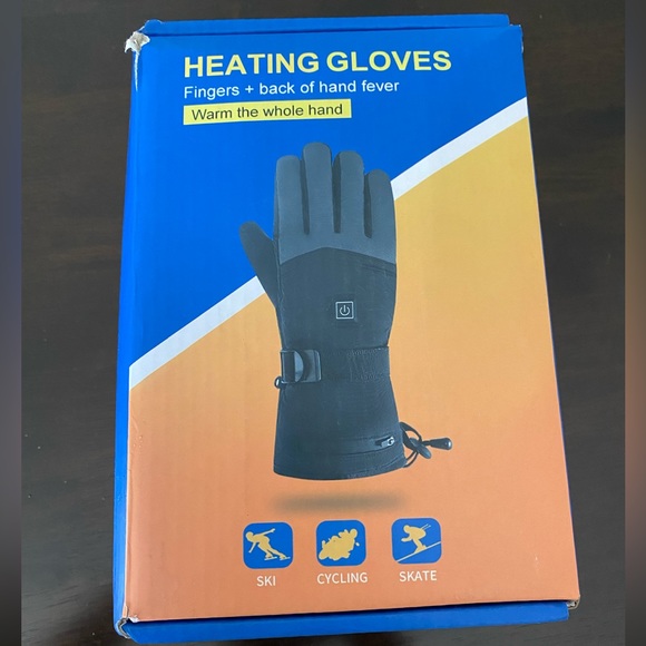 Heating Gloves Other - Brand new Heating Gloves with battery included.